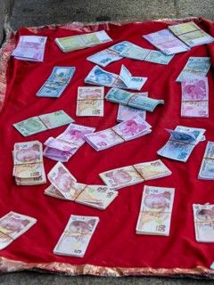 Counterfeit money is offered for sale on the street