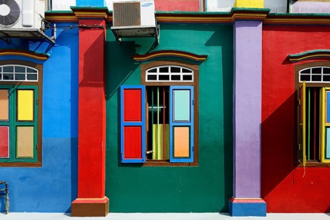 Colorful windows and facade of the old Chinese villa