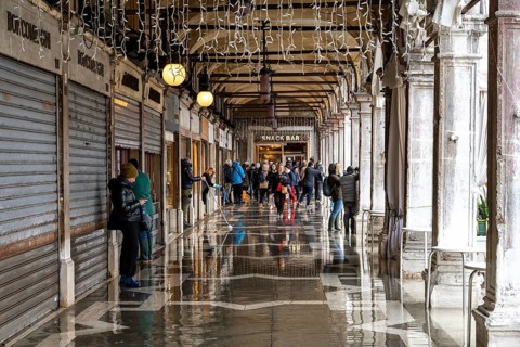 St. Mark's Square shops are protected from water during Acqua alta