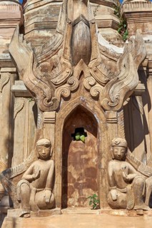 Guardian figures at tomb stupas