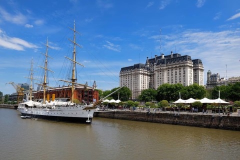 Argentinian Ministry of Defence or Libertador Building and frigate Sarmiento at Puerto Madero