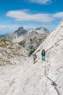 Mountaineer on marked secured route from Simonyhuette to Adamekhuette