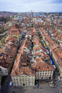 View from the Bernese Minster to the Muensterplatz and the red tiled roofs of the houses in the historic centre of the old town