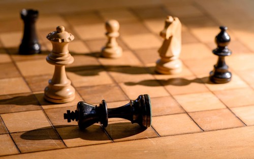 Chessboard with wooden chessmen