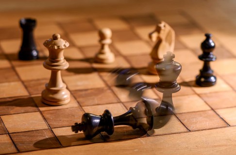 Chessboard with wooden chessmen