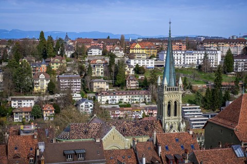 View from Bern Cathedral to the christian catholic church St. Peter and Paul in the historical centre of the old town