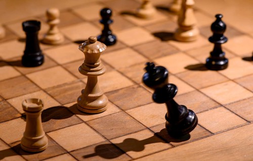 Chessboard with wooden chessmen