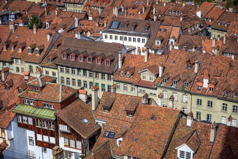 View from Bern Cathedral to the red tiled roofs of the houses in the historic centre of the old town