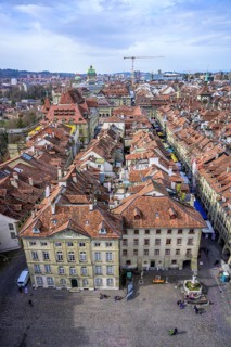 View from the Bernese Minster to the Muensterplatz and the red tiled roofs of the houses in the historic centre of the old town