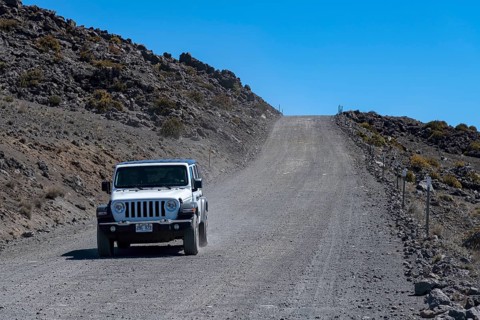 Dirt road through volcanic landscape