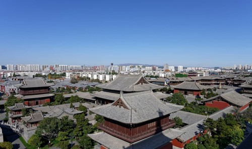 Panoramic view from the tower of Huayan Temple to traditional houses and skyline
