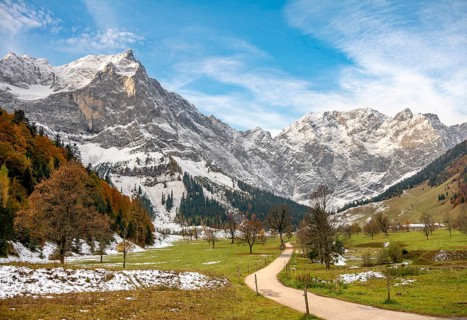 Ahornboden in autumn with snow-covered mountain peaks