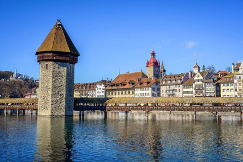 Panoramic view over the river Reuss to the Chapel Bridge and Water Tower