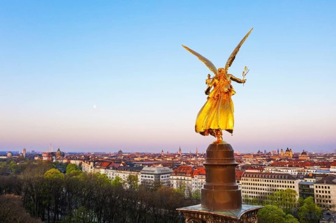 Golden angel of peace in the morning light