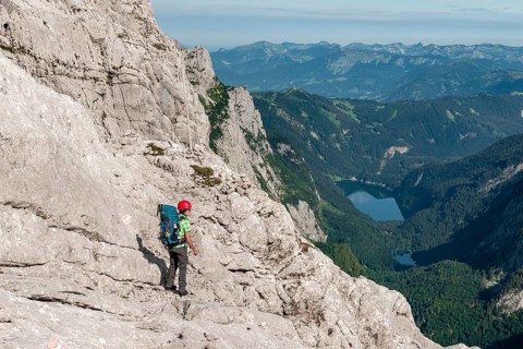 Hiker on rocky route from Simonyhuette to Adamekhuette