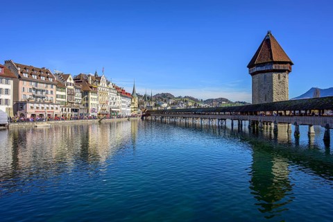 Panoramic view over the river Reuss to the Chapel Bridge and Water Tower