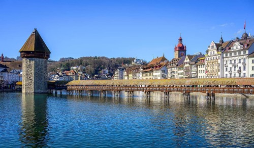 Panoramic view over the river Reuss to the Chapel Bridge and Water Tower