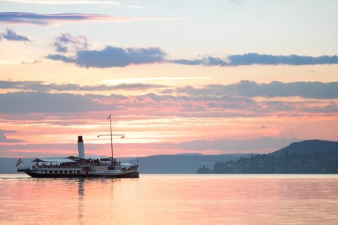 The old steamboat Hohentwiel on a sunset cruise