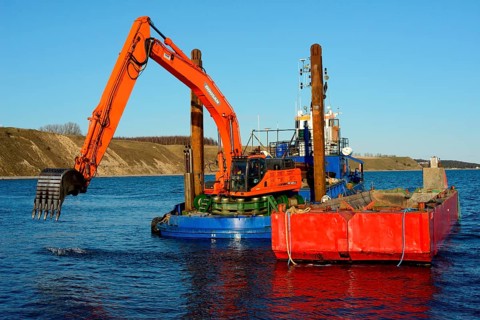 Dredger boat at work