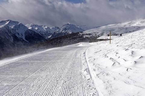 Freshly rolled ski slope at the Ausserschwemmalm mountain restaurant