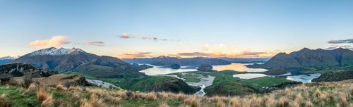 Sunset, panorama view on Wanaka Lake and mountains