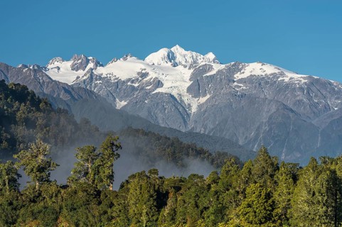 Glaciated peaks, in front subtropical forest