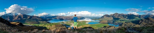 Hiker is looking out for Wanaka Lake and mountains, Rocky Peak