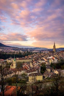 City view at sunrise, view from the rose garden to the old town