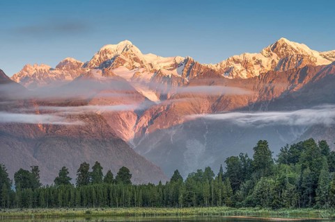 Snowy mountain peaks Mount Cook and Mount Tasman in the evening light, Westland National Park
