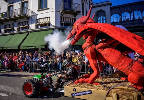 Smoking dragon figure on a float, Carnival parade of the Wey Guild on Rose Monday
