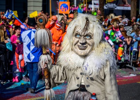 Masked woman with mask, Carnival parade of the Wey Guild on Rosenmontag