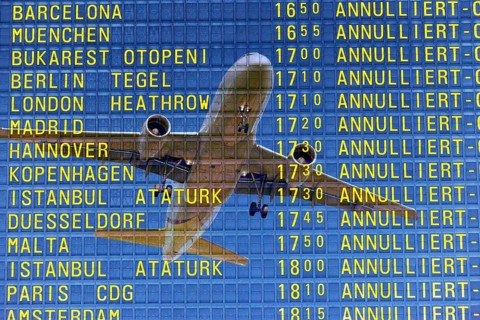 PHOTO MONTAGE, arrival and departure board at the airport