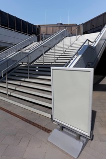 Staircase and poster stands without advertising, closed Duesseldorf exhibition centre