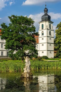 South facade with castle tower at the pond in the castle garden, baroque castle Fasanerie
