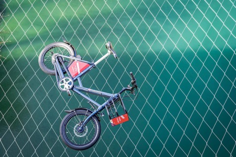 Bike of the bike sharing provider PubliBike is located on the catching net of the Kirchenfeld bridge over the Aare, bike rental