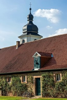 Farm building, at the back northern castle tower