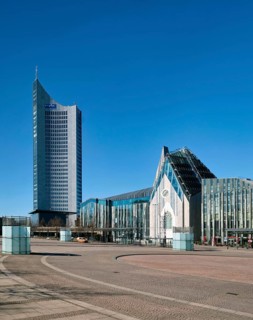 Empty Augustusplatz with City skyscraper and university, curfew due to coronavirus
