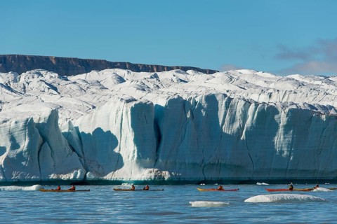 Tourists in kayaks in front of glaciers, Croker Bay