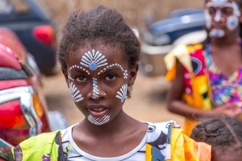 Native young girl with traditional face painting, Diego Suarez