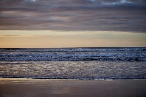 Running waves on the sandy beach