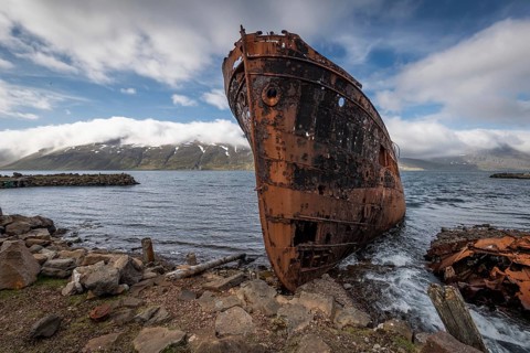 Rusty shipwreck on the beach
