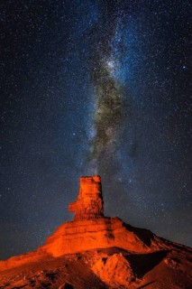 Rock formation at night with starry sky and Milky Way