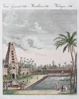 South Indian temple with temple pond and bathing Hindus