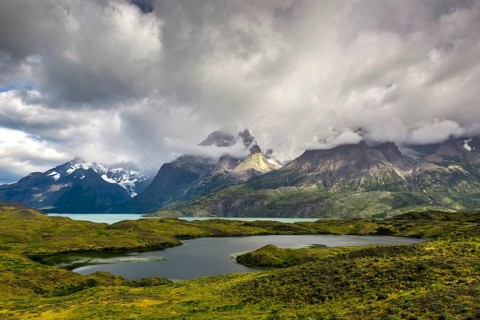View over Lake Nordenskjoeld to the mountain range Cuernos del Paine in clouds