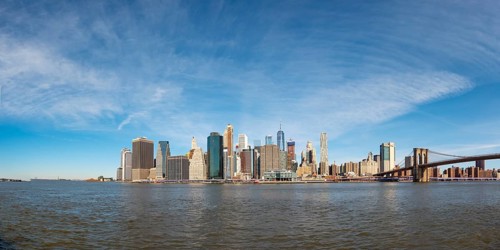 View from Pier 1 over the East River to the skyline of Lower Manhattan with Brooklyn Bridge