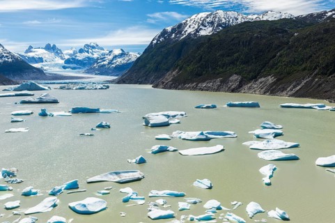 Glacial lake with small icebergs floating
