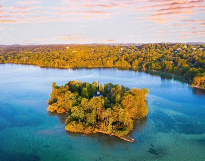 Rose island with castle in the Starnberger See near Feldafing in the morning light