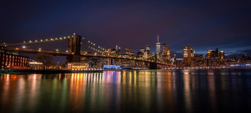 View from Main Street Park at night over the East River to the skyline of lower Manhattan