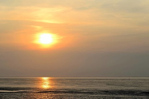 Sunset at the Wadden Sea at low tide