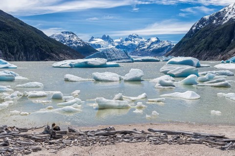 Glacial lake with small icebergs floating